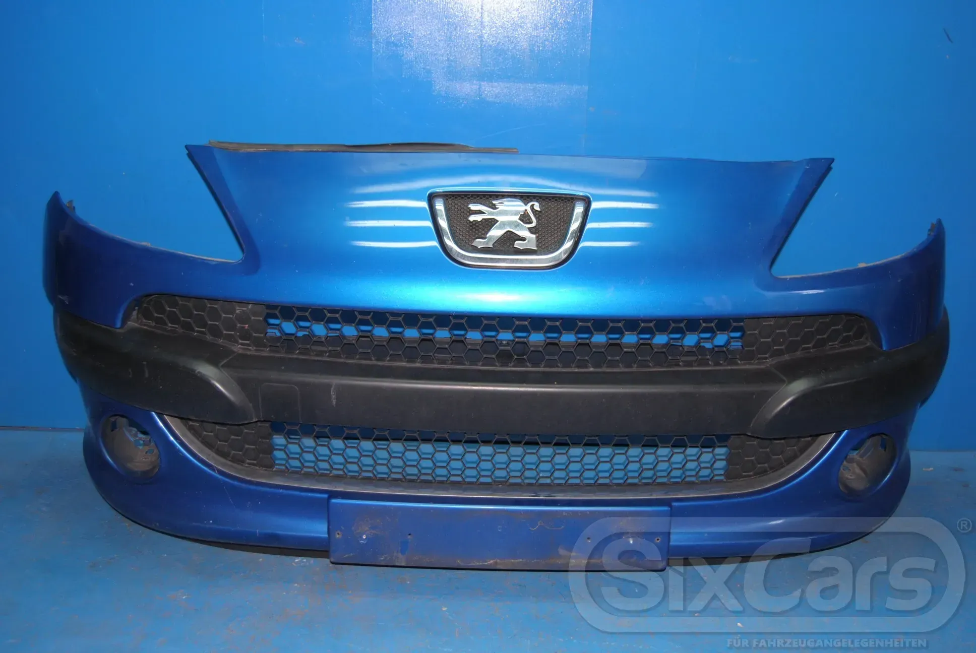 Peugeot 1007 KM Stoßstange Frontschürze Kühlergrill Logo vorne Blau KMFD - Bild 1