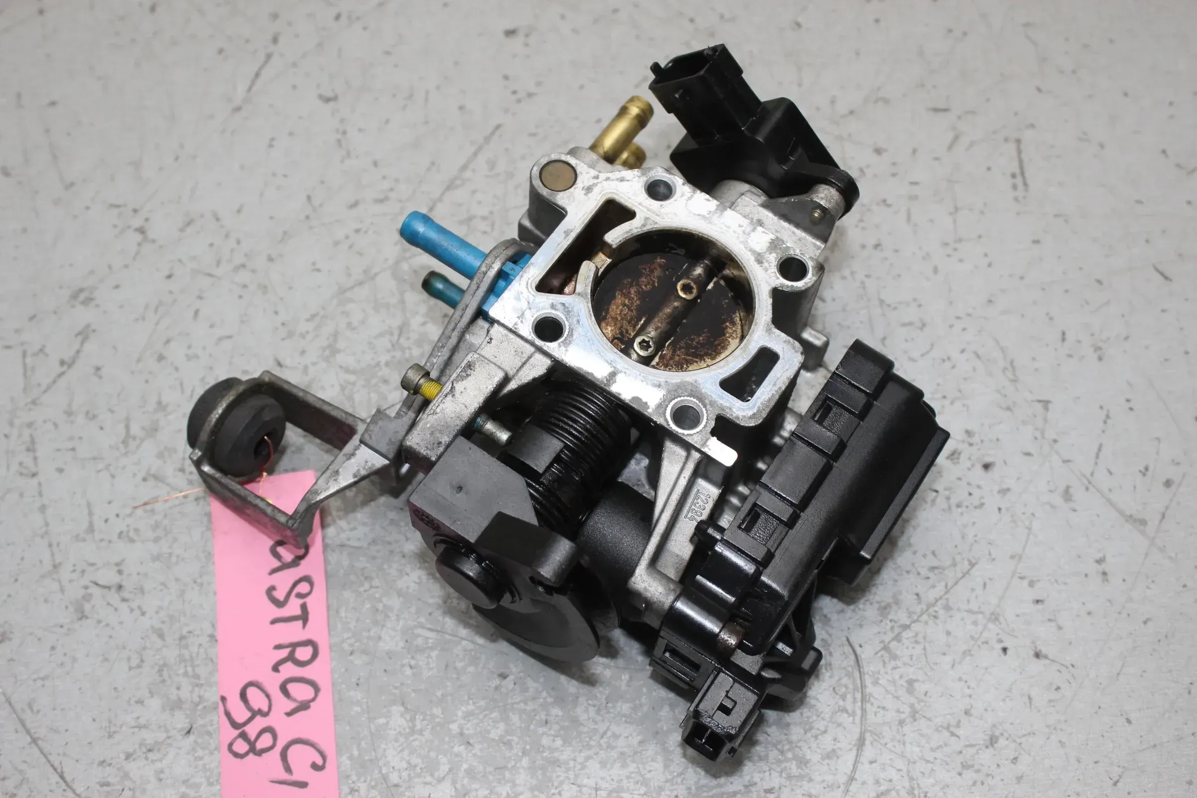 Drosselklappe 90529471 Opel Astra G 1.2 Bj.98 - Bild 1