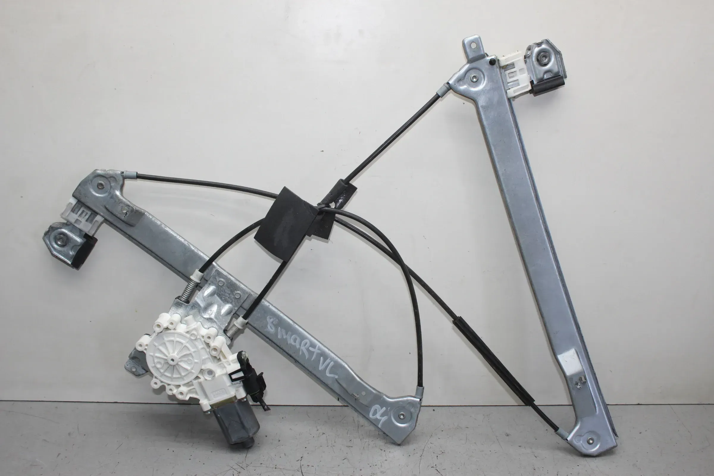 Fensterheber Motor mit Gestänge vorne links B130138032 Smart Forfour 454 Bj.04 - Bild 1