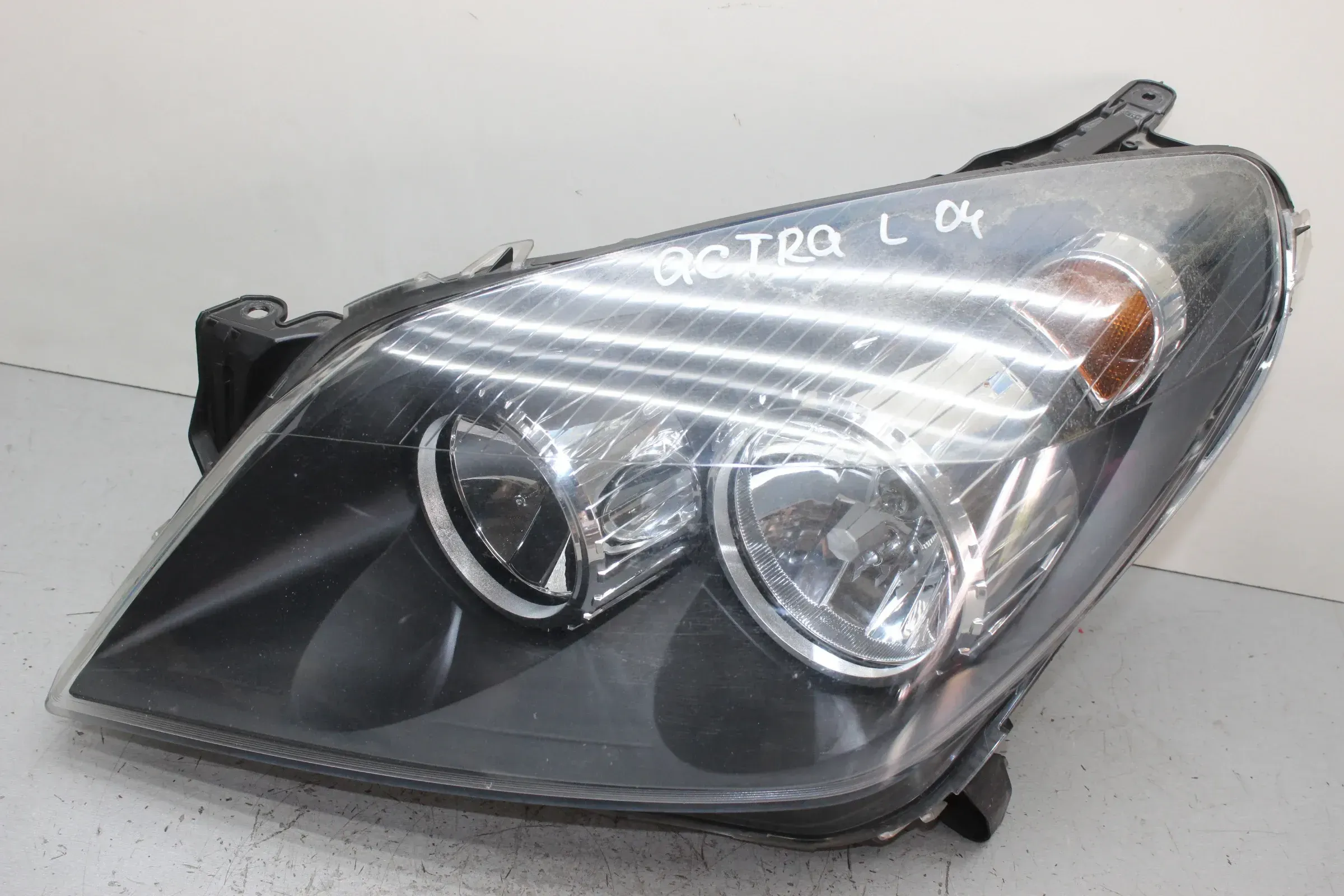 Frontscheinwerfer Scheinwerfer vorne links 24451032 Opel Astra H Bj.04 - Bild 1
